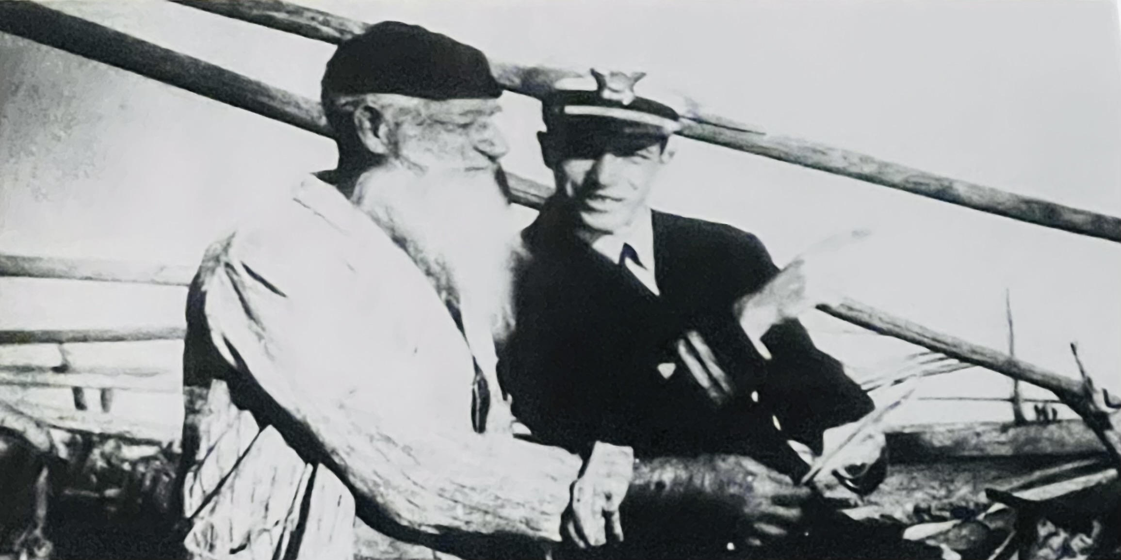 A vintage photograph of Lt. Clay Pell, from New York, explaining new regulations to a whiskered Sicilian fisherman. LT Pell was one of the Coast Guard Officers assisting in the restoration of the island’s fishing industry. (U.S. Coast Guard) A vintage photograph of Lt. Clay Pell, from New York, explaining new regulations to a whiskered Sicilian fisherman. LT Pell was one of the Coast Guard Officers assisting in the restoration of the island’s fishing industry. (U.S. Coast Guard)